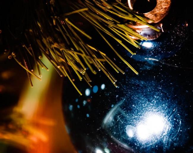A blue, glass ornament on my Christmas tree 